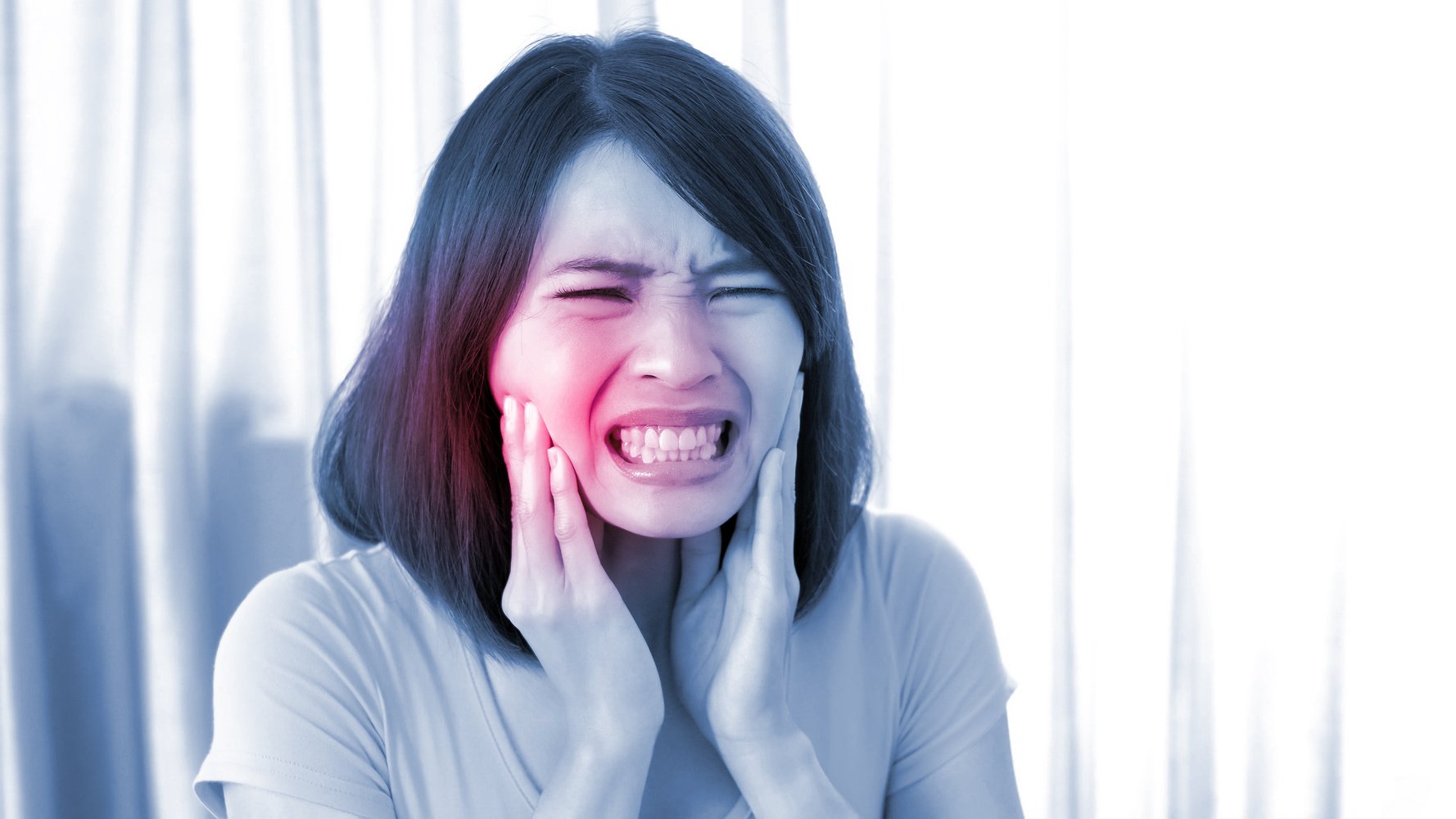 Woman in Pain with Toothache